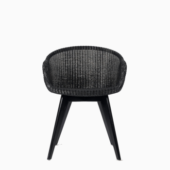 Vincent Sheppard Avril dining chair in black with a woven backrest and a black wooden base