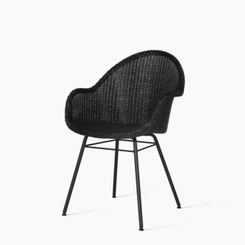 Vincent Sheppard Avril HB dining chair in black with a woven backrest and a steel A-shaped base