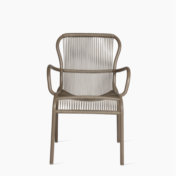 Vincent Sheppard Loop dining chair in taupe with a sleek, woven rope design and curved armrests.