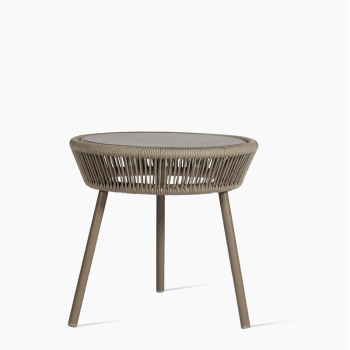  Vincent Sheppard Loop side table in taupe with a woven rope design, round glass top, and sleek metal legs.