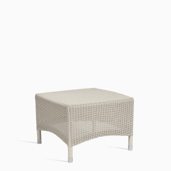 Sheppard Safi side table in old lace with a woven rattan design and rounded edges.