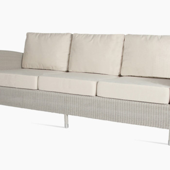 Vincent Sheppard Safi three-seater lounge sofa in old lace with a woven rattan design, featuring cushioned seat and backrest for added comfort.