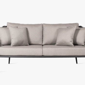 Vincent Sheppard Leo lounge sofa in lava with linen-coloured cushions, featuring a rope-woven backrest and cushioned seat for comfort.