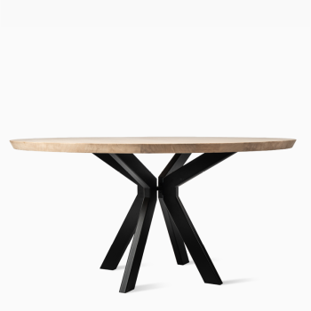 Table à manger ronde Albert de Vincent Sheppard avec un plateau en bois massif et un pied en métal noir en forme d'araignée, au design moderne et robuste.