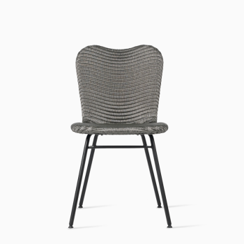 Vincent Sheppard Lily dining chair in Oyster with a woven rattan design, featuring a steel A-frame base in black, offering a stylish and contemporary look.