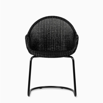  Vincent Sheppard Avril HB dining chair with a black cantilever base.