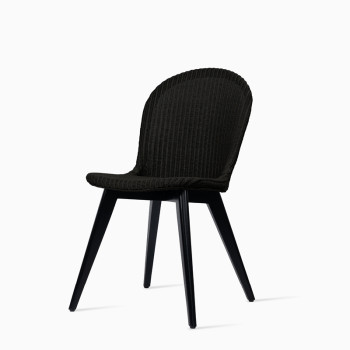 Vincent Sheppard Yann dining chair with a black wood base and black finish.