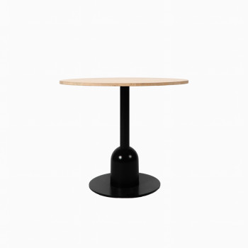 Vincent Sheppard bistro table with an untreated oak round tabletop and a black pedestal base.