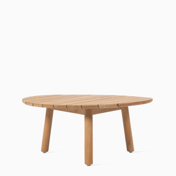 Vincent Sheppard Anton coffee table made from untreated teak with a round, slatted design.