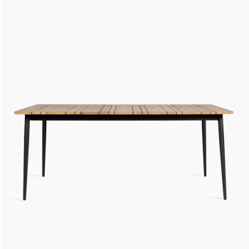 Vincent Sheppard Max dining table, 180 cm in length, featuring an untreated teak top and a lava-coloured frame.