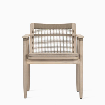  Vincent Sheppard David dining armchair with an aged teak frame, greige rope accents, and an almond cushion.