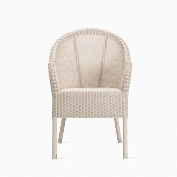 Vincent Sheppard Mia dining chair in old lace wicker, featuring a classic woven design with metal-capped legs.