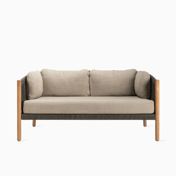 Vincent Sheppard Lento lounge sofa with almond cushions and a teak frame.