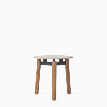 Vincent Sheppard Lento side table with a Portland top and untreated teak legs.