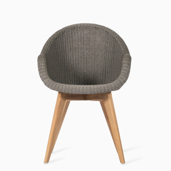  Vincent Sheppard Remi dining chair with a fossil grey woven seat and oak base.