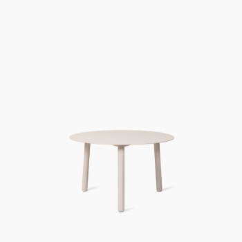 Vincent Sheppard Lilo coffee table with a 60 cm diameter round top in dune white, supported by three cylindrical legs.