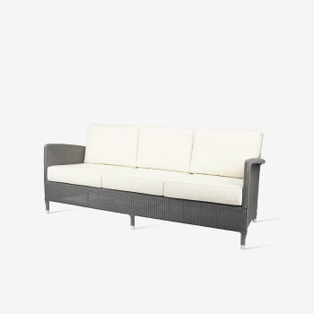 Vincent Sheppard Dovile 3-Sitzer-Loungesofa mit grauem geflochtenem Rahmen und cremefarbenen Kissen