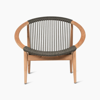 Vincent Sheppard Frida lounge chair with a circular wooden frame and anthracite rope detailing.