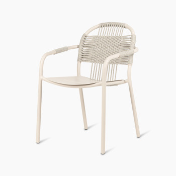 Vincent Sheppard Cleo dining armchair in dune white with a woven backrest and aluminium frame.