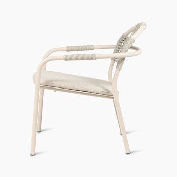 Vincent Sheppard Cleo lounge chair in dune white with an almond-coloured seat cushion