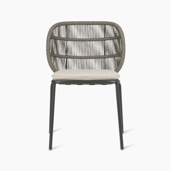 Front view of Vincent Sheppard Kodo dining chair with a fossil grey frame and almond cushion.