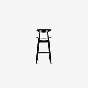 Tabouret de bar Teo par Vincent Sheppard avec un siège, un dossier et un cadre en contreplaqué noir au design minimaliste.