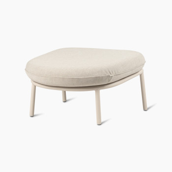 45-degree view of the Kodo footrest in Dune white with almond cushion by Vincent Sheppard.