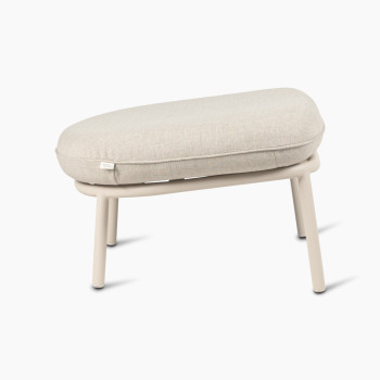 Side view of the Kodo footrest in Dune white with almond cushion by Vincent Sheppard.