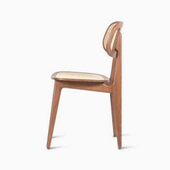 Side view of a Titus dining chair in tobacco stained beech with a woven cane backrest and seat.