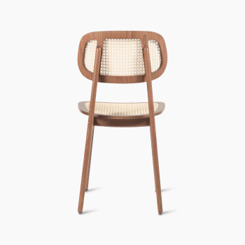 Back view of a Titus dining chair in tobacco stained beech with a woven cane backrest and seat.