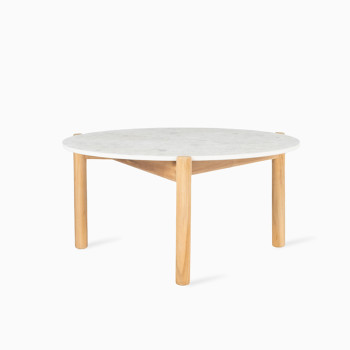 Vincent Sheppard Oda outdoor coffee table with a shards ceramic top and teak legs.