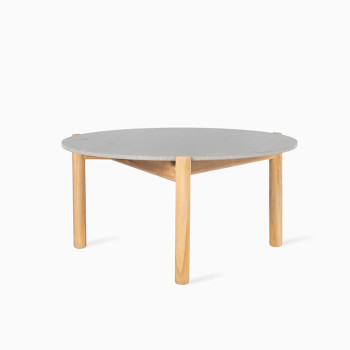 Vincent Sheppard Oda outdoor coffee table with a flint ceramic top and teak legs.