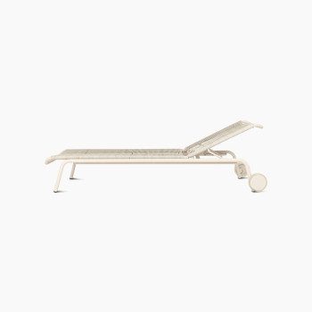 Side view of the Kodo sunlounger in Dune white without cushion by Vincent Sheppard.