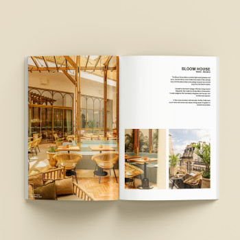 Open brochure met een weergave van Bloom House in Parijs, met de nadruk op de buitenzitruimte met Vincent Sheppard’s Roy Cocoon-stoelen, houten tafels en planten onder een glazen dak.