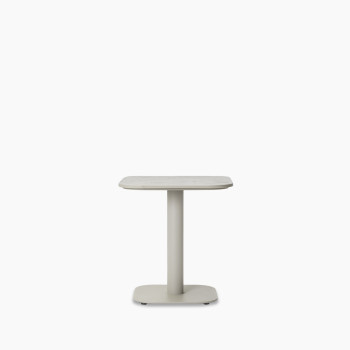  Vincent Sheppard Kodo side table in Shards/Dune White with a square top featuring a subtle stone effect and a central pedestal base.