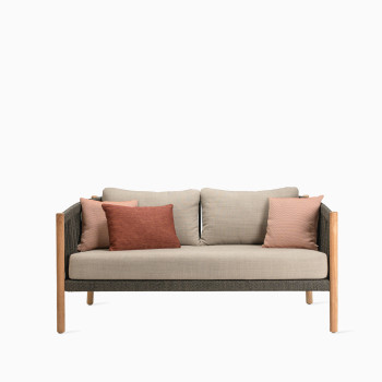 Vincent Sheppard Lento lounge sofa with stone dust cushions and decorative accent cushions.