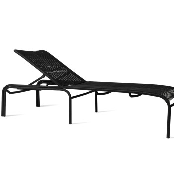 Vincent Sheppard Loop sunlounger with a black metal frame and woven seat.