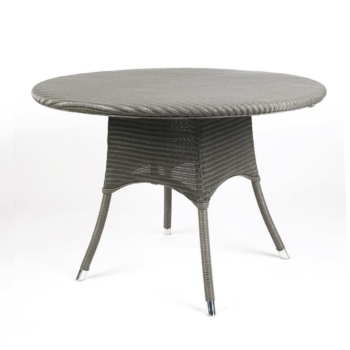 Vincent Sheppard Nimes outdoor Paper Loom table with a round top and slim woven legs, featuring a sturdy and elegant design.