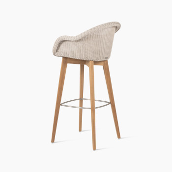 Edgard barstool with a teak base and Old Lace-coloured wicker seat by Vincent Sheppard, 135-degree angle view.