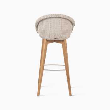 Edgard barstool with a teak base and Old Lace-coloured wicker seat by Vincent Sheppard, back view.