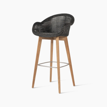 Edgard barstool with a teak base and mocca wicker seat by Vincent Sheppard, 45-degree angle view.