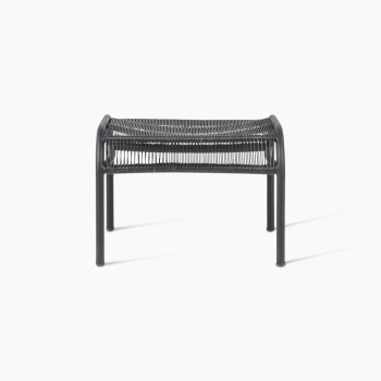 Front view of the Loop footrest in black by Vincent Sheppard, featuring a curved metal frame