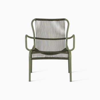 Front view of the Loop lounge chair in moss colour by Vincent Sheppard, featuring a curved metal frame and tightly woven Paper Loom strands for the seat and backrest, offering a sleek and contemporary design.