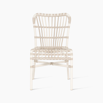 Lucy dining chair by Vincent Sheppard, made of synthetic wicker in off-white colour, featuring a woven design and no cushion