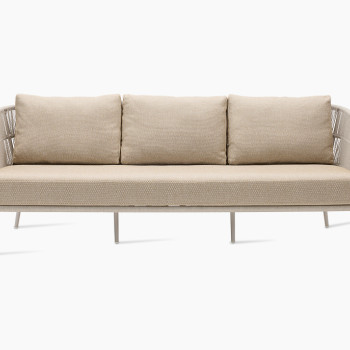 Front view of the Akari lounge sofa 3-seater by Vincent Sheppard, featuring a dune white aluminum frame, rope-woven seating and backrest, and Santal-coloured cushions, displayed in a horizontal picture format.