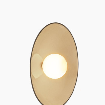 Arvin wall lamp from Vincent Sheppard, featuring a handmade ceramic shade in mushroom colour and a brass fixture for a refined, contemporary look.